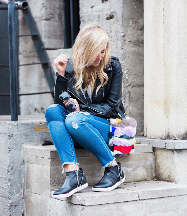 Fashion blogger Nikki Minton of My Style Diaries shares easy budget basics - distressed denim, faux leather jacket, leather sneakers, and a versatile tee - that are all under $100.