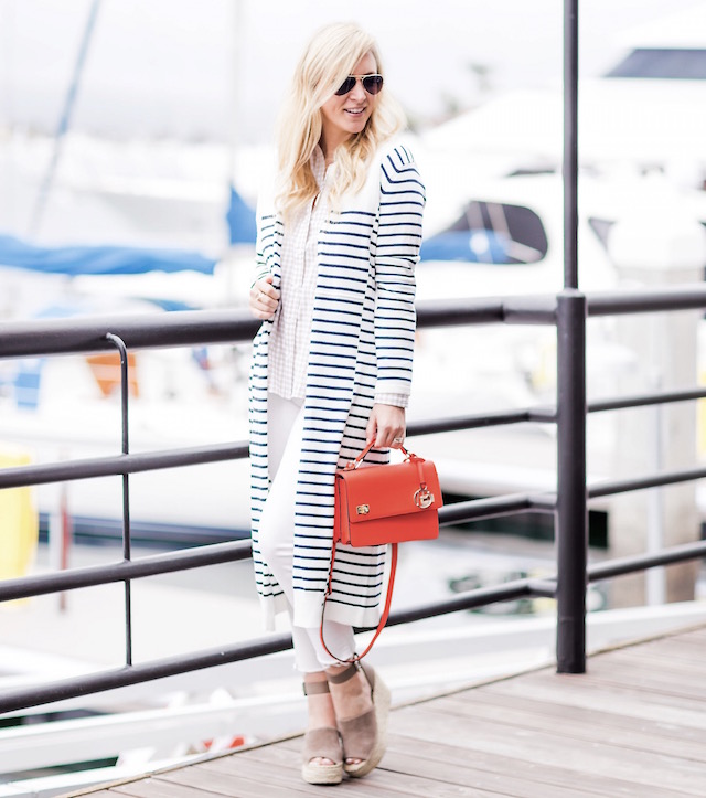 Orange County fashion blogger Nikki Prendergast of My Style Diaries wears an Evy's Tree button-down and cabi cardigan with a Henri Bendel bag and Marc Fisher wedges.