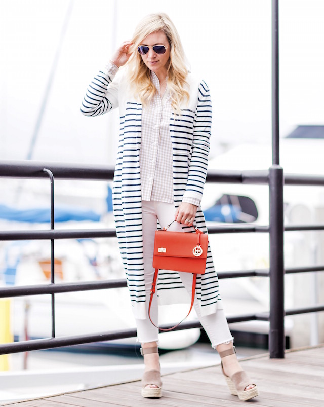 Orange County fashion blogger Nikki Prendergast of My Style Diaries wears an Evy's Tree button-down and cabi cardigan with a Henri Bendel bag.