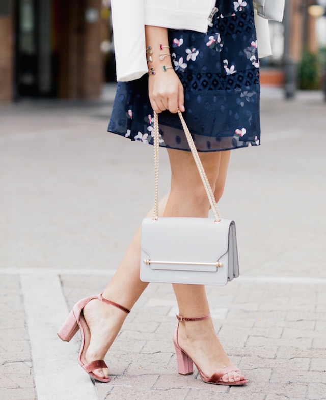 Aqua navy floral dress + Strathberry handbag + velvet heels